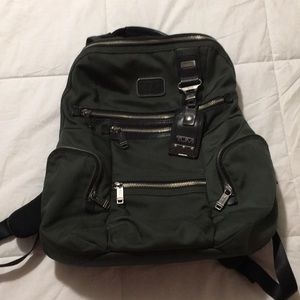 Tumi Olive Green backpack. In great condition.